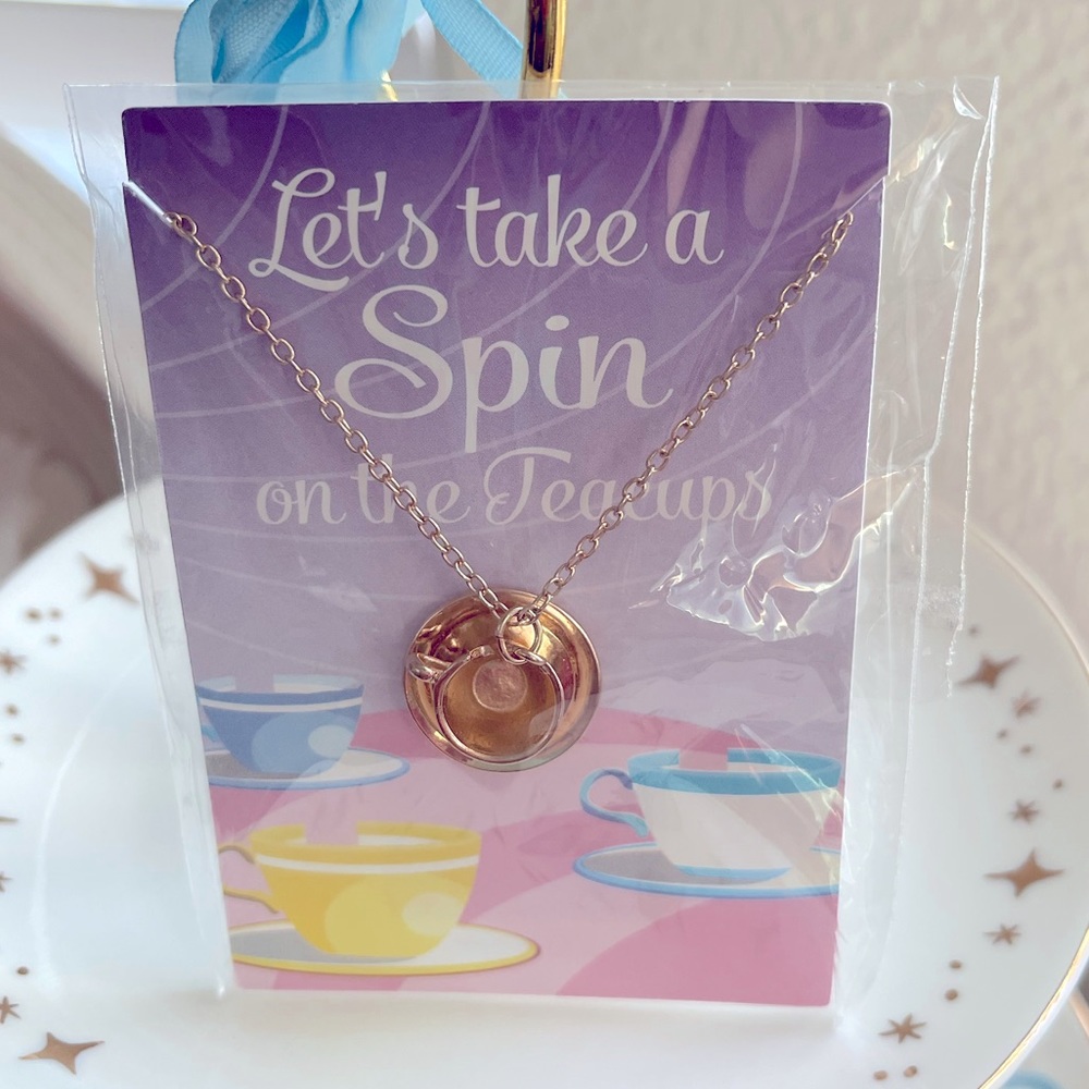Let’s take a spin on the teacups necklace from Disney Parks.